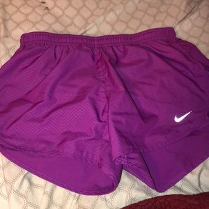 Purple Nike shorts